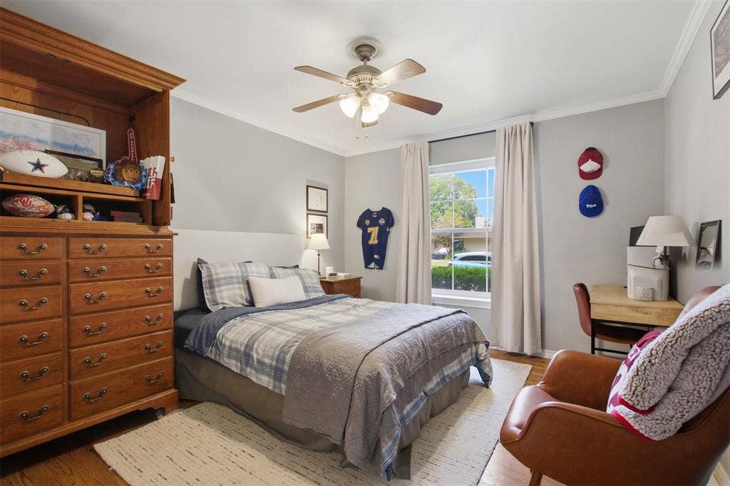 3612 Regent Drive, Dallas, TX 75229 Recessed window with white trim, wood-finish flooring, ceiling fan with light fixture, and crown molding