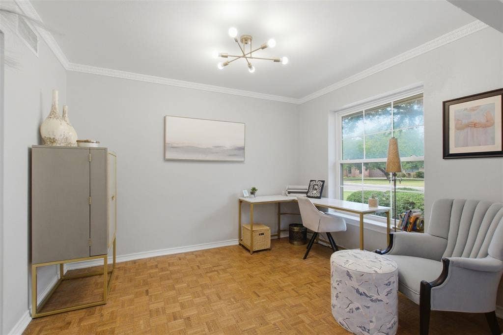 3612 Regent Drive, Dallas, TX 75229 Crown molding, contemporary ceiling light fixture, large window, wood-finish flooring