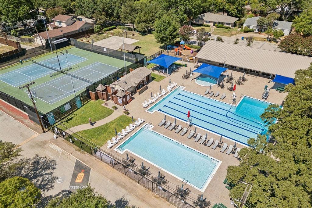3612 Regent Drive, Dallas, TX 75229 Two hard surface tennis courts, two outdoor swimming pools, a separate children's wading pool, and adjacent recreation building