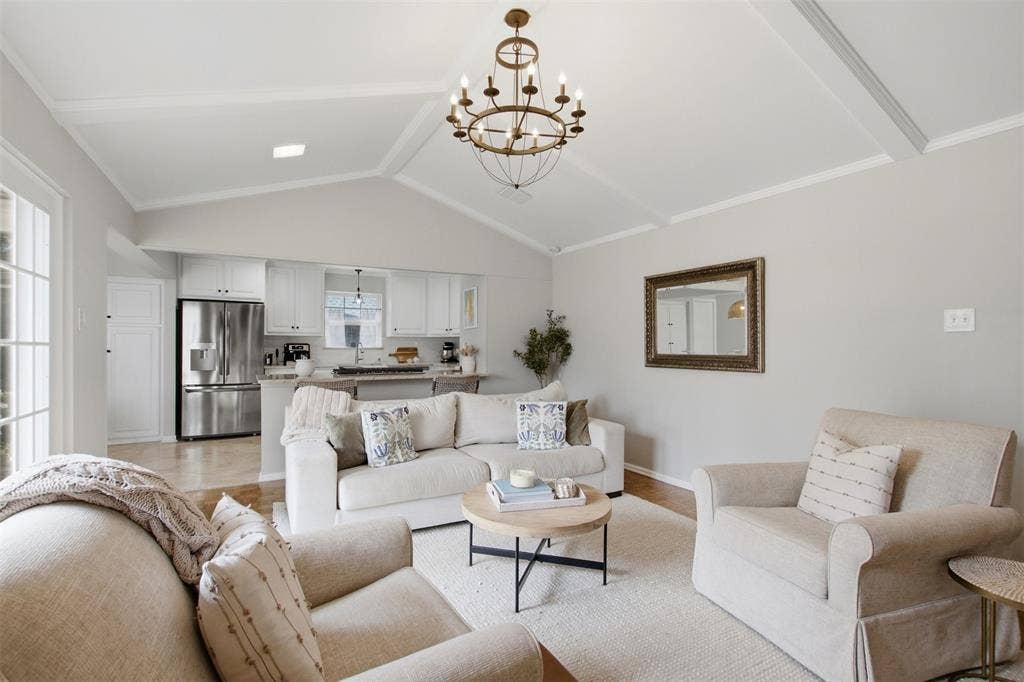 3612 Regent Drive, Dallas, TX 75229 Vaulted ceiling with exposed beams, wood-finish flooring, recessed lighting, and kitchen with stainless steel appliances