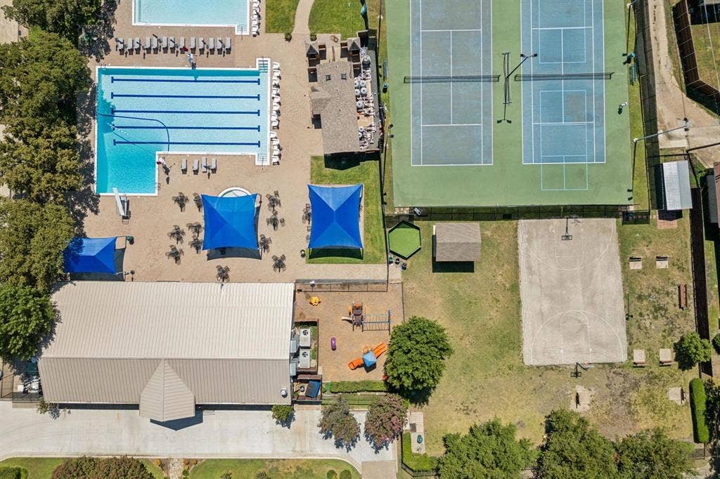 3612 Regent Drive, Dallas, TX 75229 Community recreation area featuring a large swimming pool, two tennis courts, a basketball court, and a playground