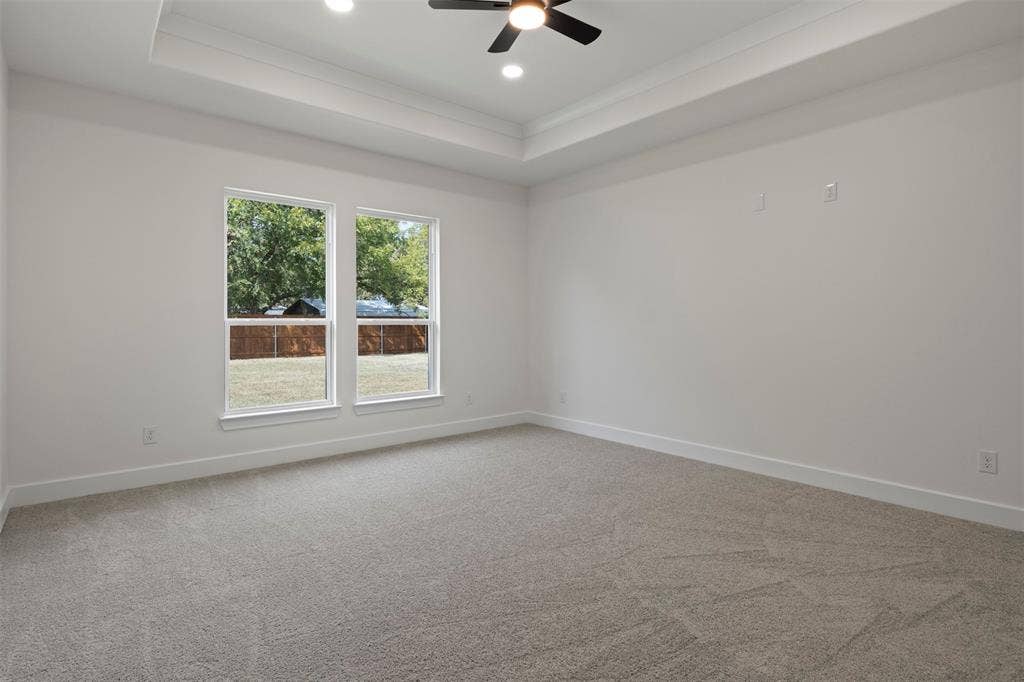 2507 Picadilly Boulevard, Mesquite, TX 75149 Recessed lighting and ceiling fan complement a tray ceiling