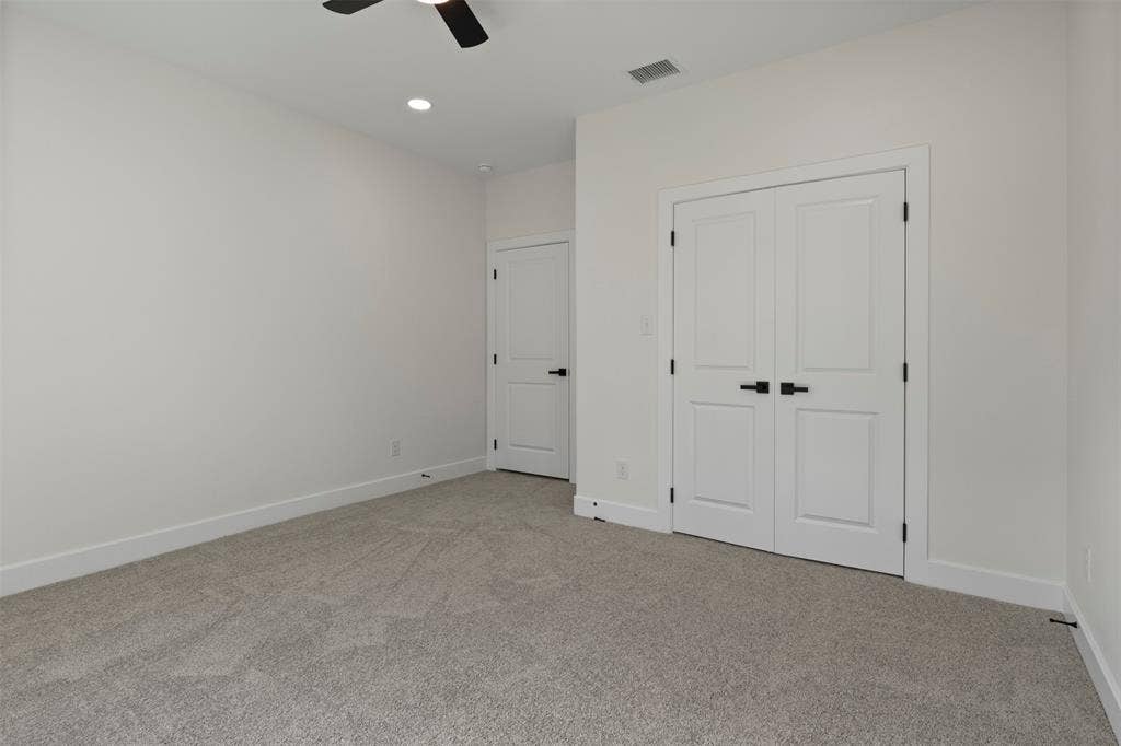 2507 Picadilly Boulevard, Mesquite, TX 75149 Neutral-toned carpeting, white walls, and white trim