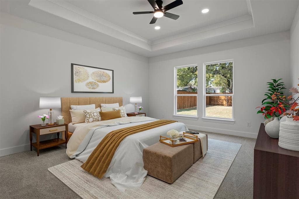 2507 Picadilly Boulevard, Mesquite, TX 75149 Tray ceiling with recessed lighting and a ceiling fan, two large windows, and wall-to-wall carpeting