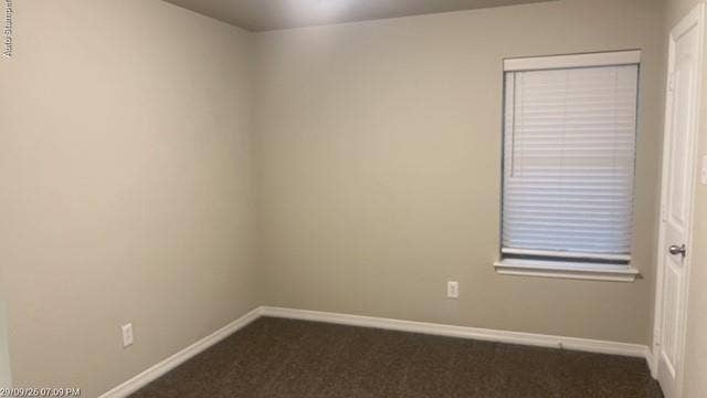 Neutral wall tones, carpeted flooring, window with blinds, and white trim throughout