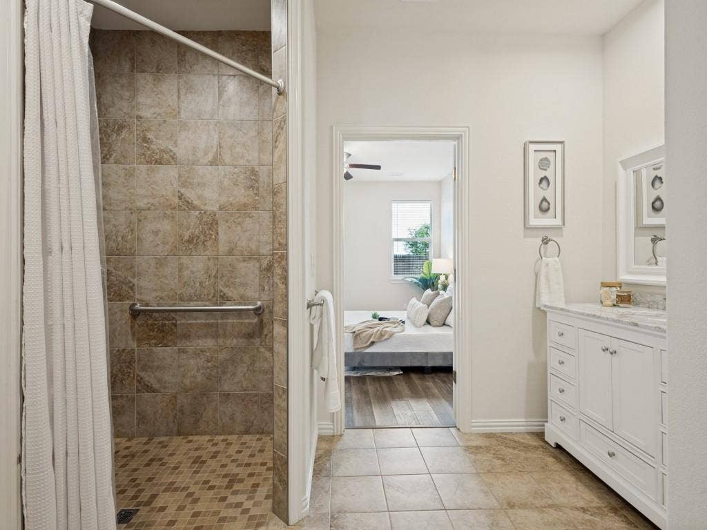 1512 Fields View Drive, Anna, TX 75409 The primary shower is huge! Wheel chair assessable, and upgraded tile.