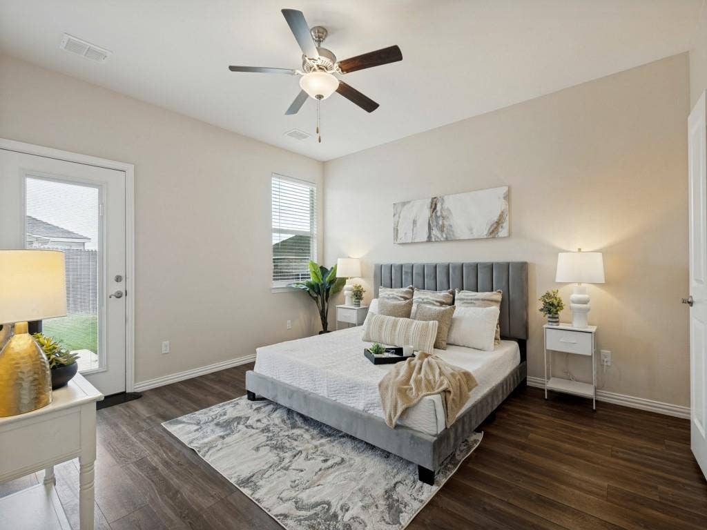 1512 Fields View Drive, Anna, TX 75409 Primary bedroom is nice and spacious and offers a door direct to the backyard and patio.