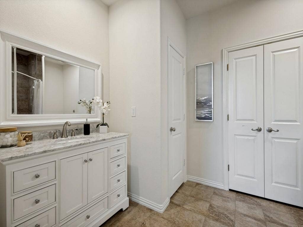 1512 Fields View Drive, Anna, TX 75409 The primary bathroom is a must see! Upgraded vanity with a linen closet and huge walk in closet.