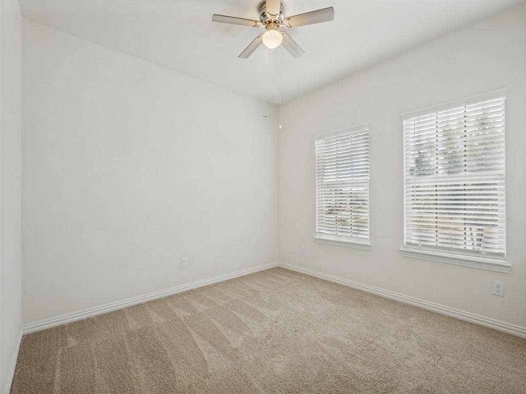 1512 Fields View Drive, Anna, TX 75409 Two additional bedrooms in the front of the home with a full bathroom between. Ceiling fans in all bedrooms.