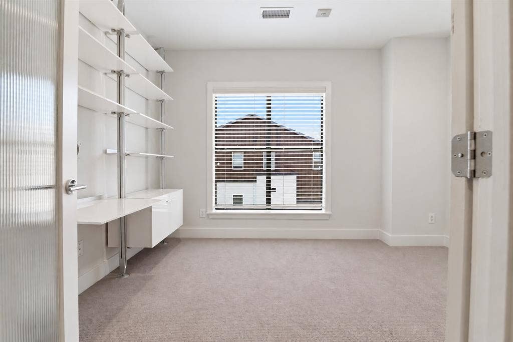 4211 Rawlins Street, #530, Dallas, TX 75219 Ligne Roset shelving added to Flex space.