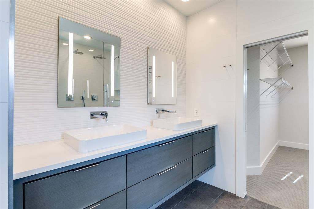 4211 Rawlins Street, #530, Dallas, TX 75219 AiO Lighted mirrored medicine cabinet, quartz countertops & Porcelanosa tile throughout the bath