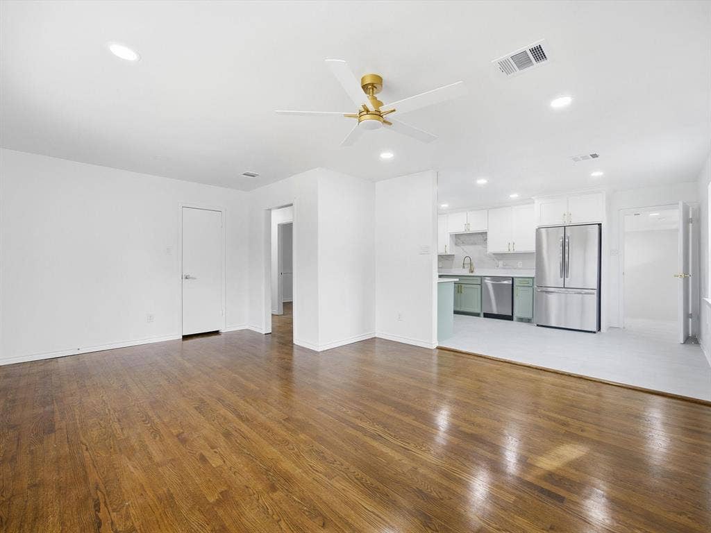 10270 Kilkenny Place, Dallas, TX 75228 Wood-finish flooring throughout, recessed lighting, and a modern ceiling fan with gold-tone accents