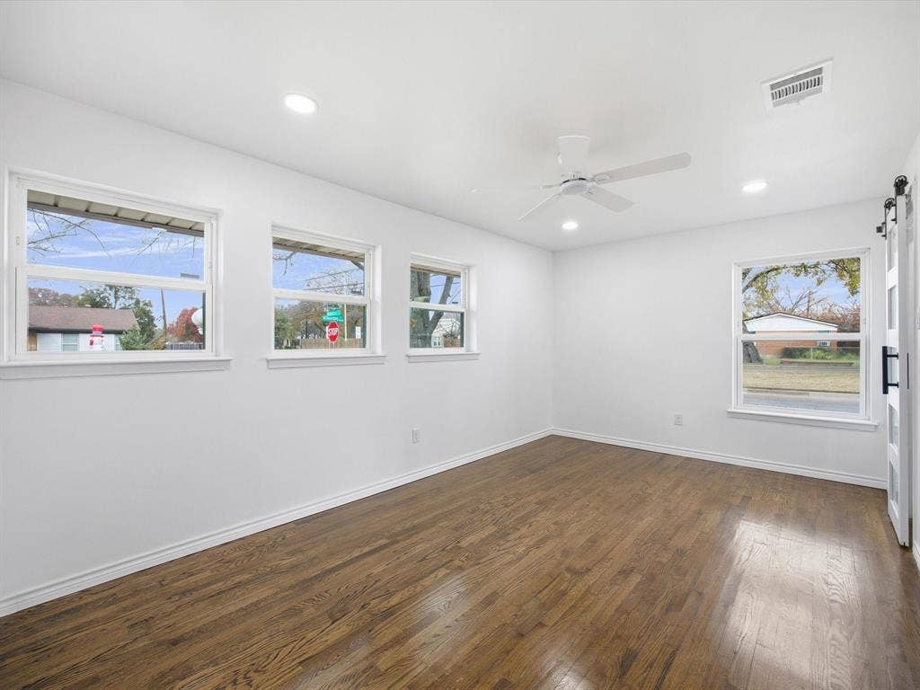 10270 Kilkenny Place, Dallas, TX 75228 Wood-finish flooring, recessed lighting, and a ceiling fan