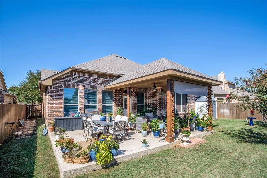 Covered patio and extended concrete that make entertaining easy.