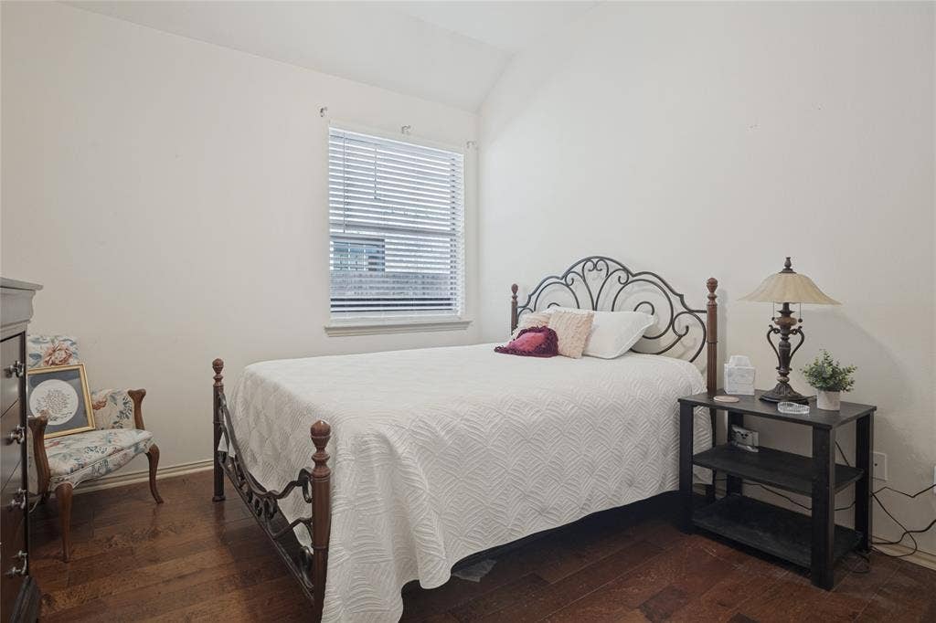 Spacious secondary bedrooms are thoughtfully situated in a separate wing of the home, offering added privacy and a comfortable retreat for family or guests. Each bedroom features a walk-in closet, providing plenty of storage space and functionality.