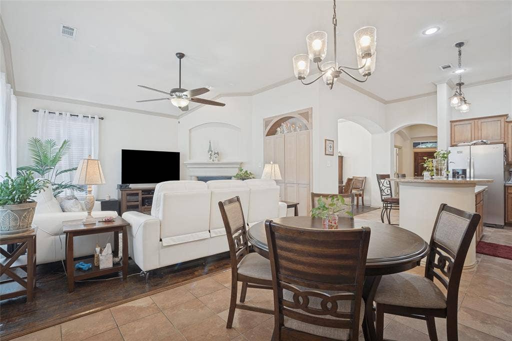 The charming breakfast nook offers a cozy spot to enjoy your morning coffee, casual family meals, and everyday moments, all while taking in views of the backyard.