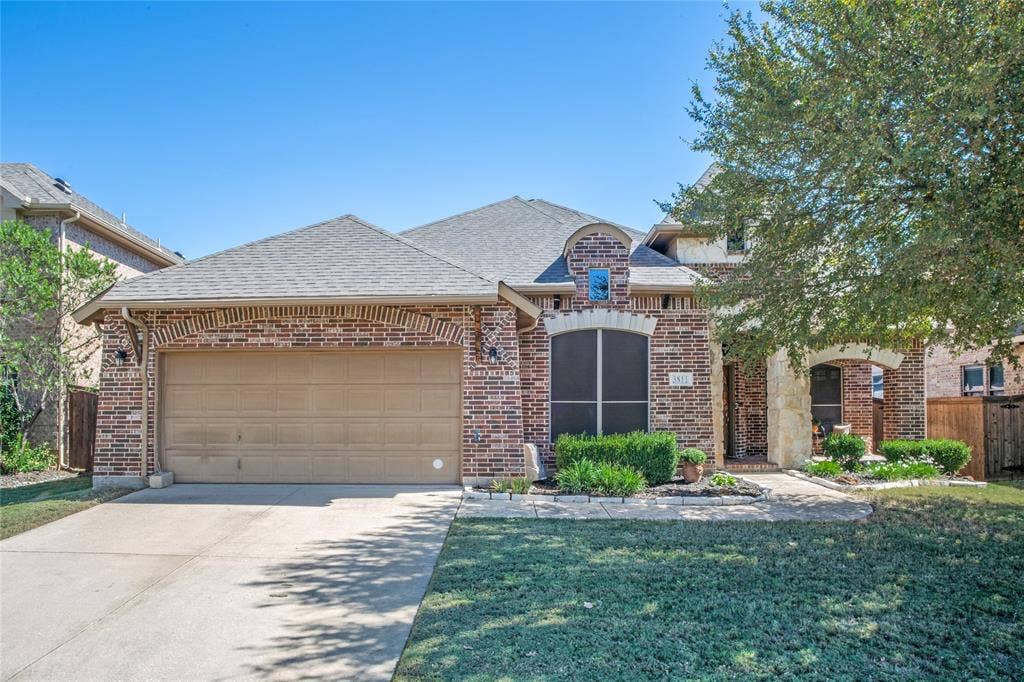 Welcoming curb appeal sets the tone for this beautifully maintained home.