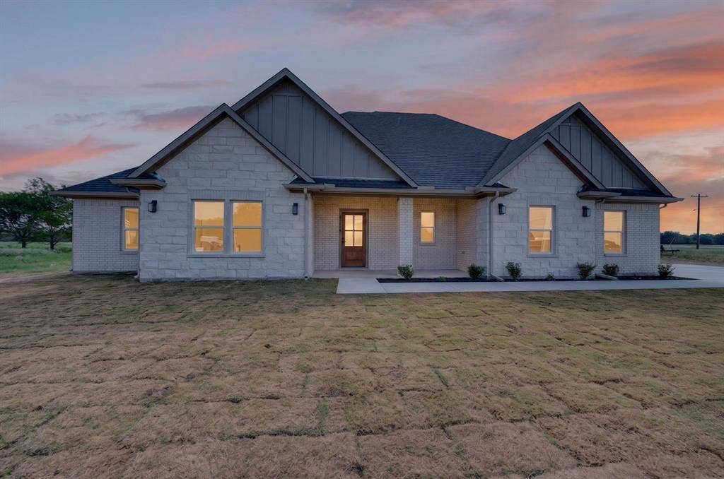 5731 Lewis Court, Athens, TX 75752 Stone masonry exterior with board and batten gables