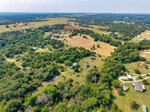 6630 Prather Road, Springtown, TX 76082 Expansive rural landscape featuring scattered homes, mature trees, and open fields
