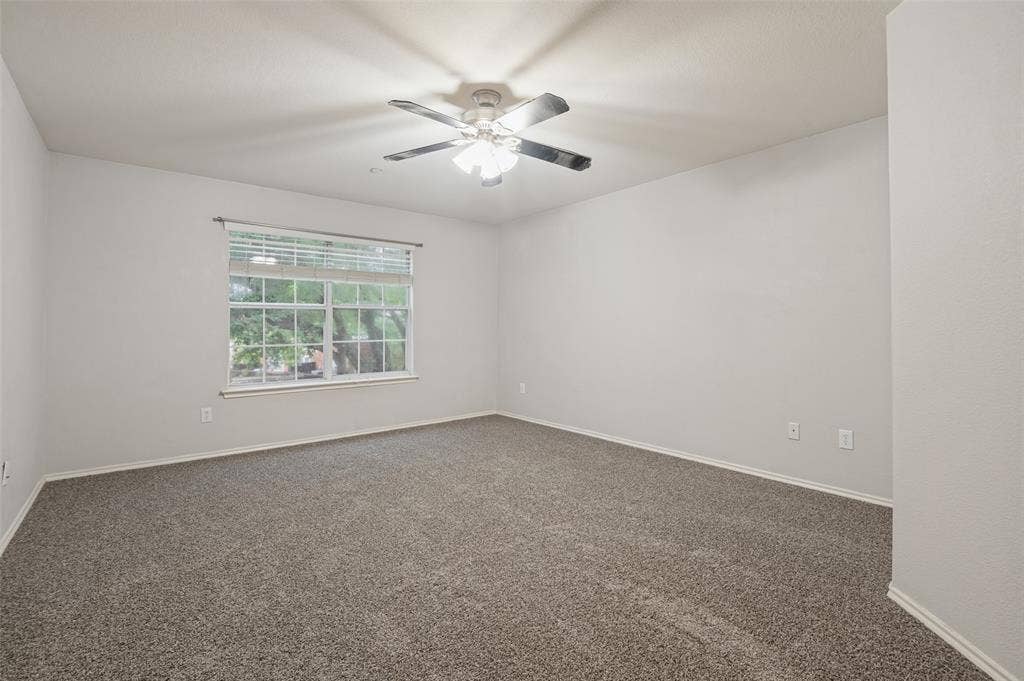 3236 Twist Trail, Plano, TX 75093 Neutral tone wall paint, textured carpet, ceiling fan with integrated lighting, and window with blinds