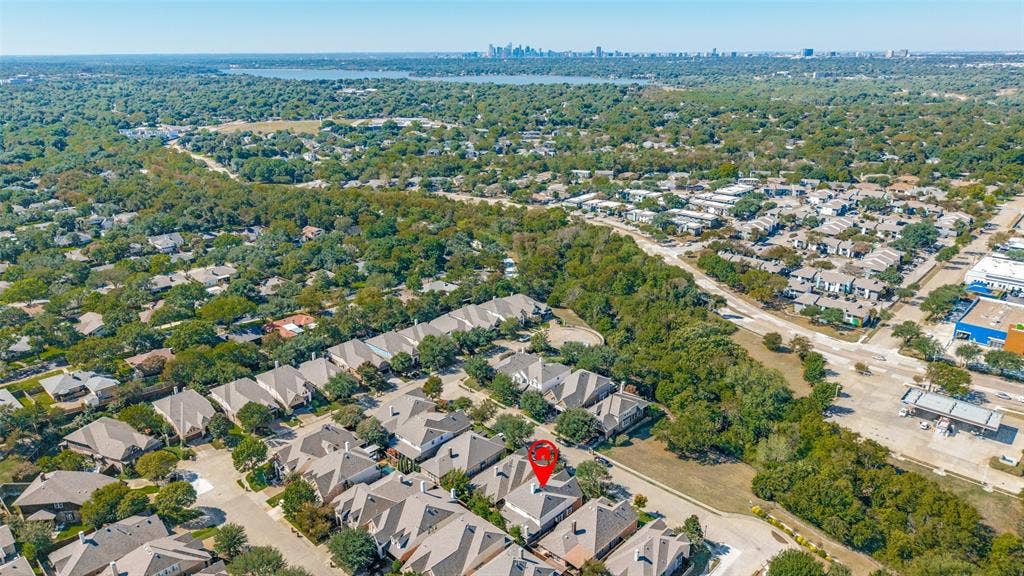 close to White Rock Lake and downtown