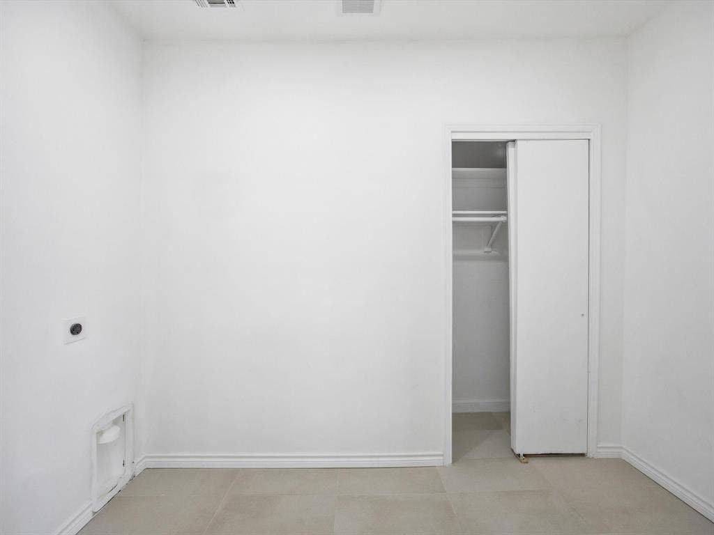 10270 Kilkenny Place, Dallas, TX 75228 White walls and light-colored tile flooring