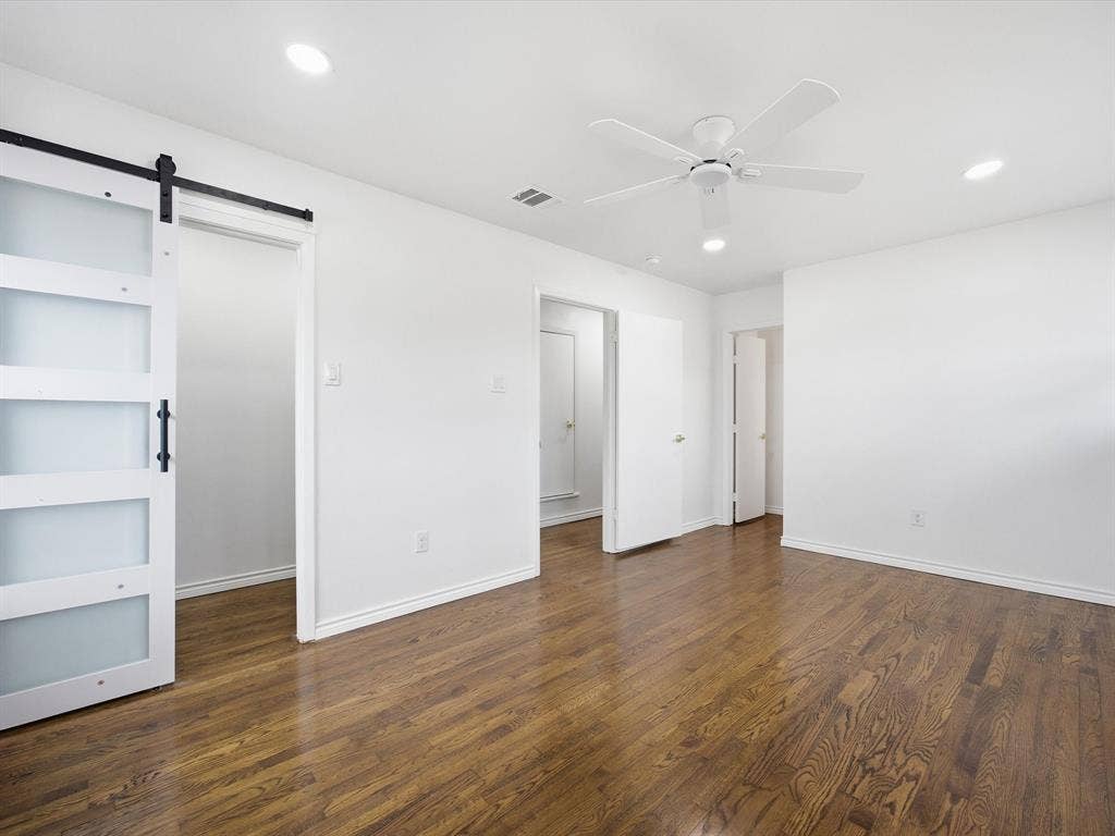 10270 Kilkenny Place, Dallas, TX 75228 Hardwood flooring, crisp white walls, recessed lighting, and a white ceiling fan