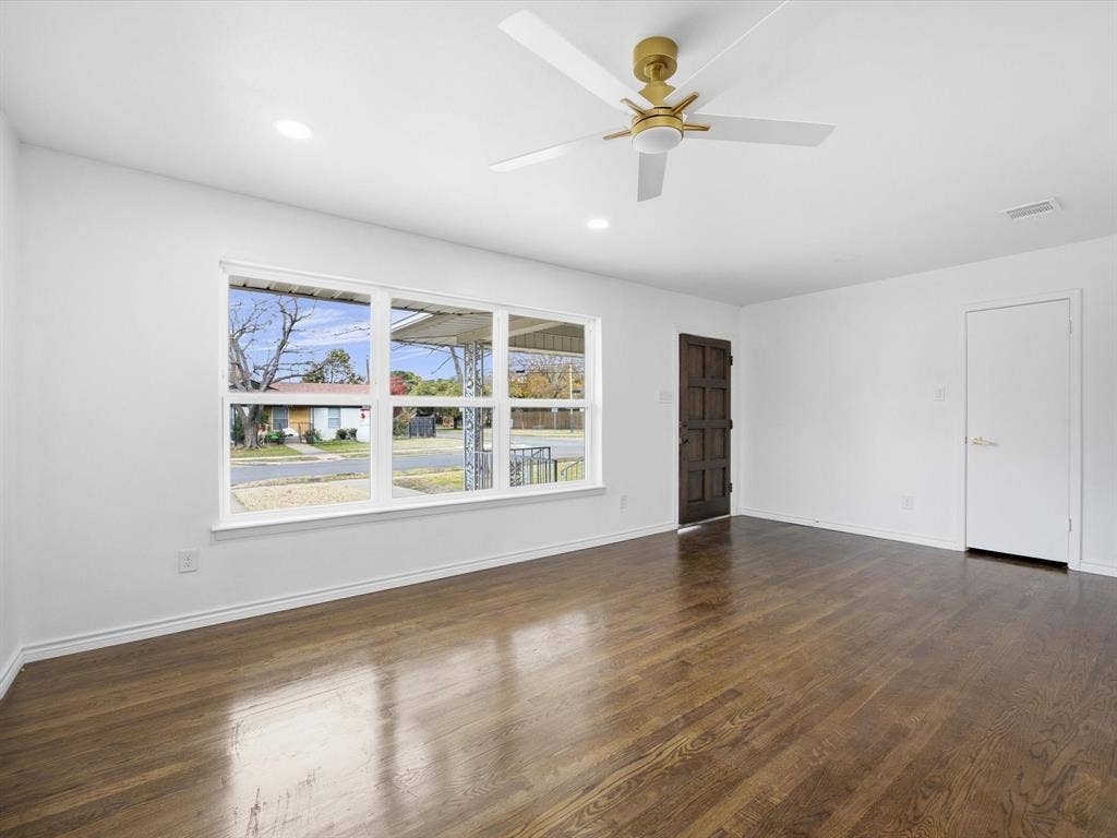 10270 Kilkenny Place, Dallas, TX 75228 Wood-finish flooring with a large window, recessed lighting, and a ceiling fan