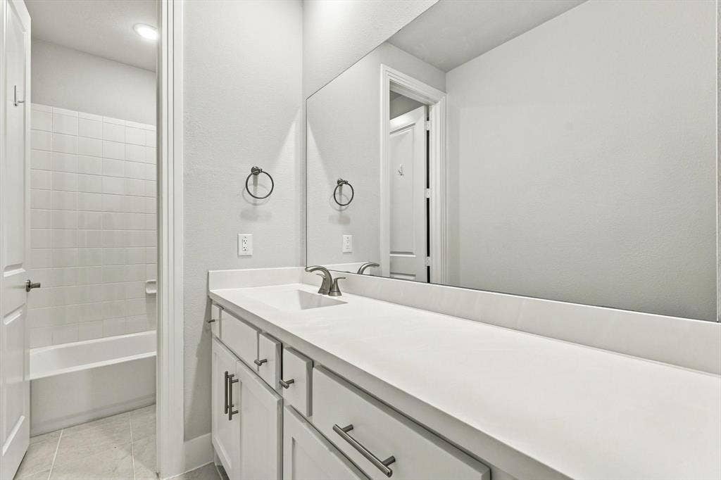 4230 Crown Run Road, Midlothian, TX 76065 Guest bathroom with dual sinks.