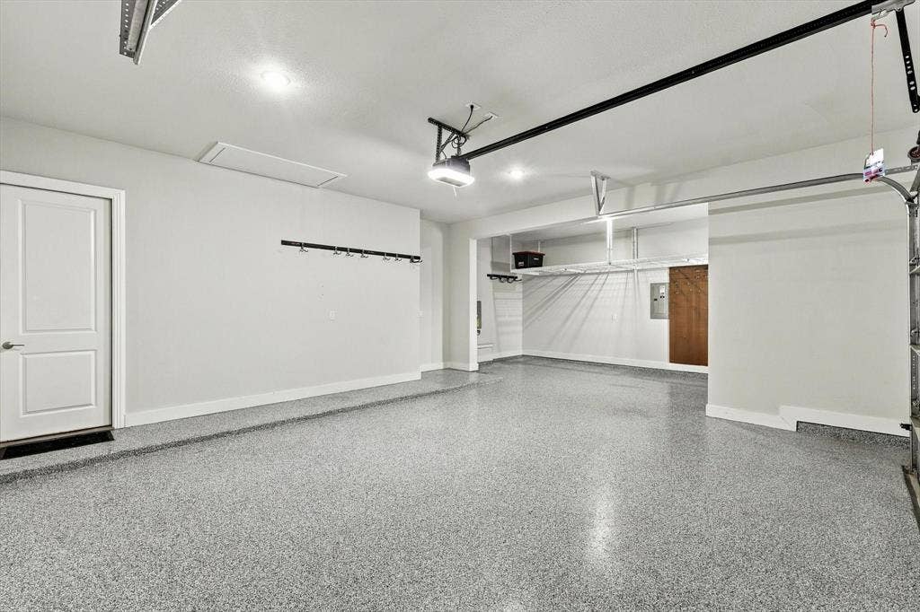 4230 Crown Run Road, Midlothian, TX 76065 Oversized garage with built in storage and plug for electic car