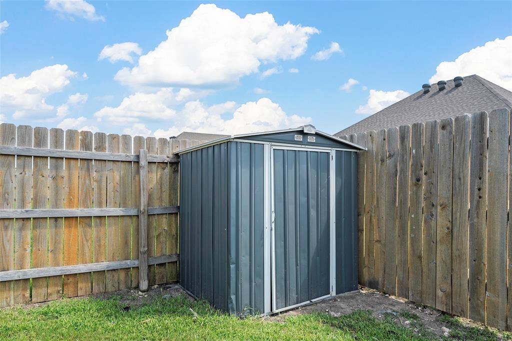 3217 Beutel Road, Lorena, TX 76655 View of shed featuring a fenced backyard