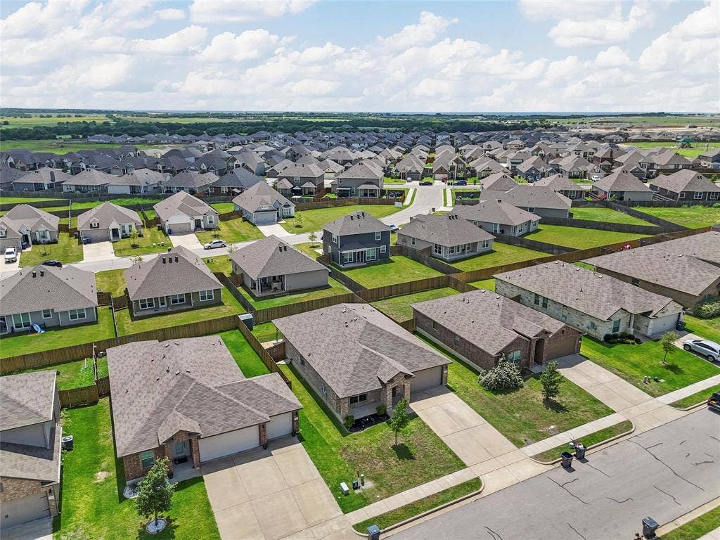 3217 Beutel Road, Lorena, TX 76655 Aerial perspective of suburban area
