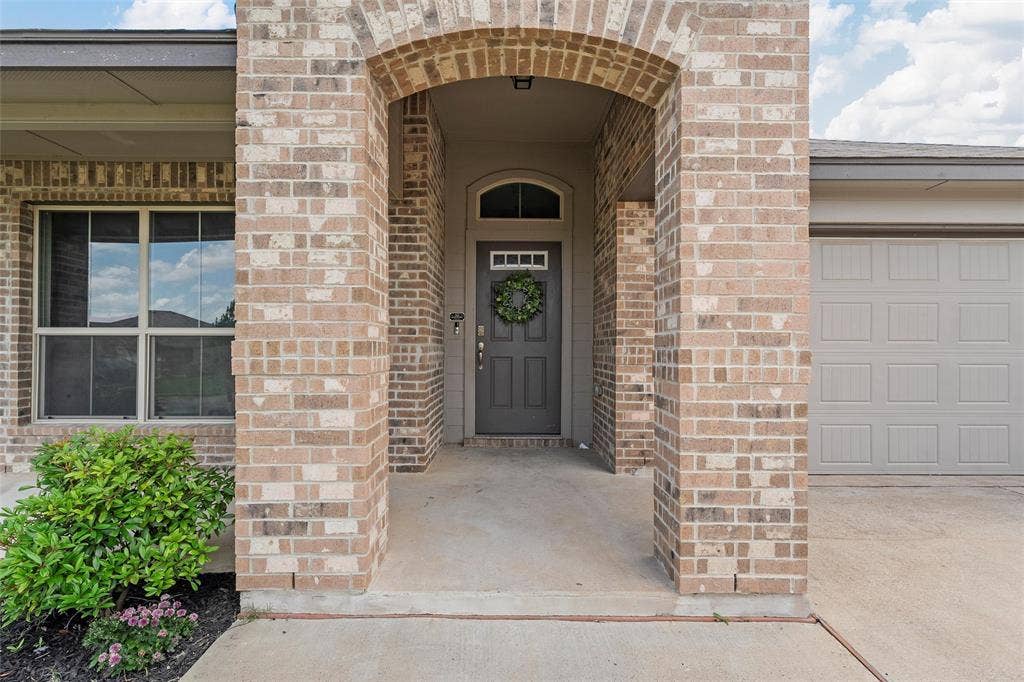 3217 Beutel Road, Lorena, TX 76655 Entrance to property with brick siding