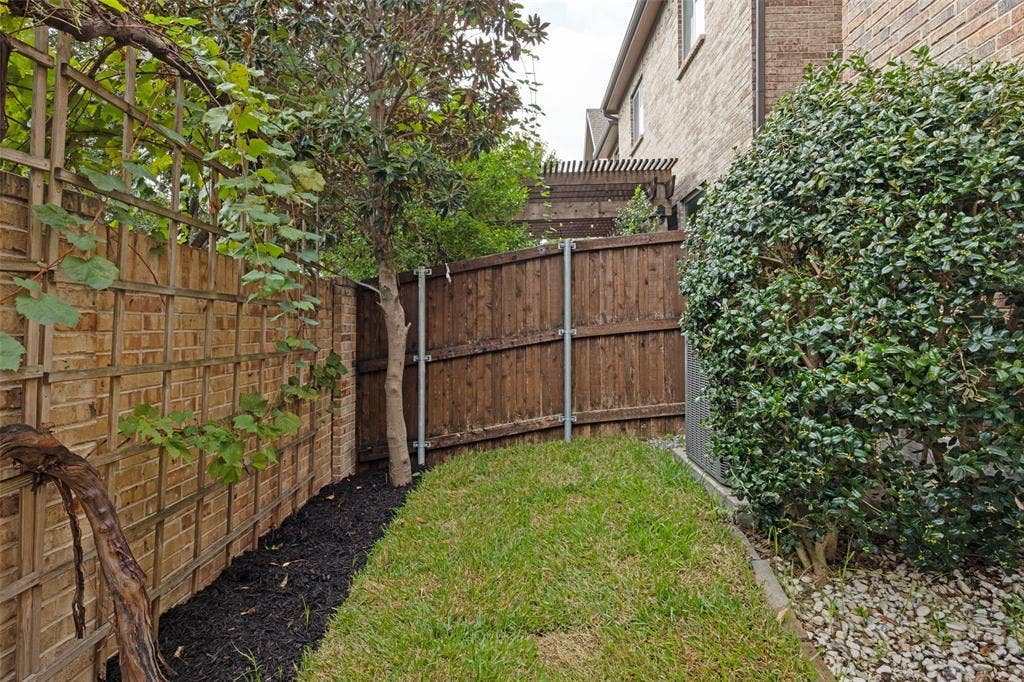 Grassy pet area in backyard