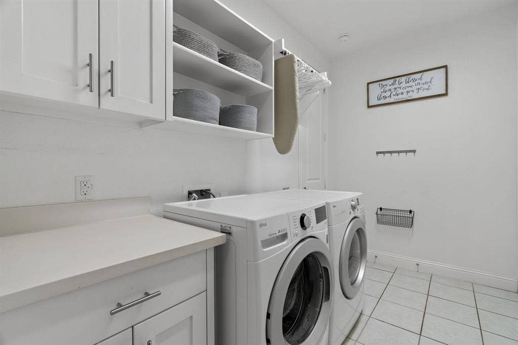 Huge laundry room with storage!