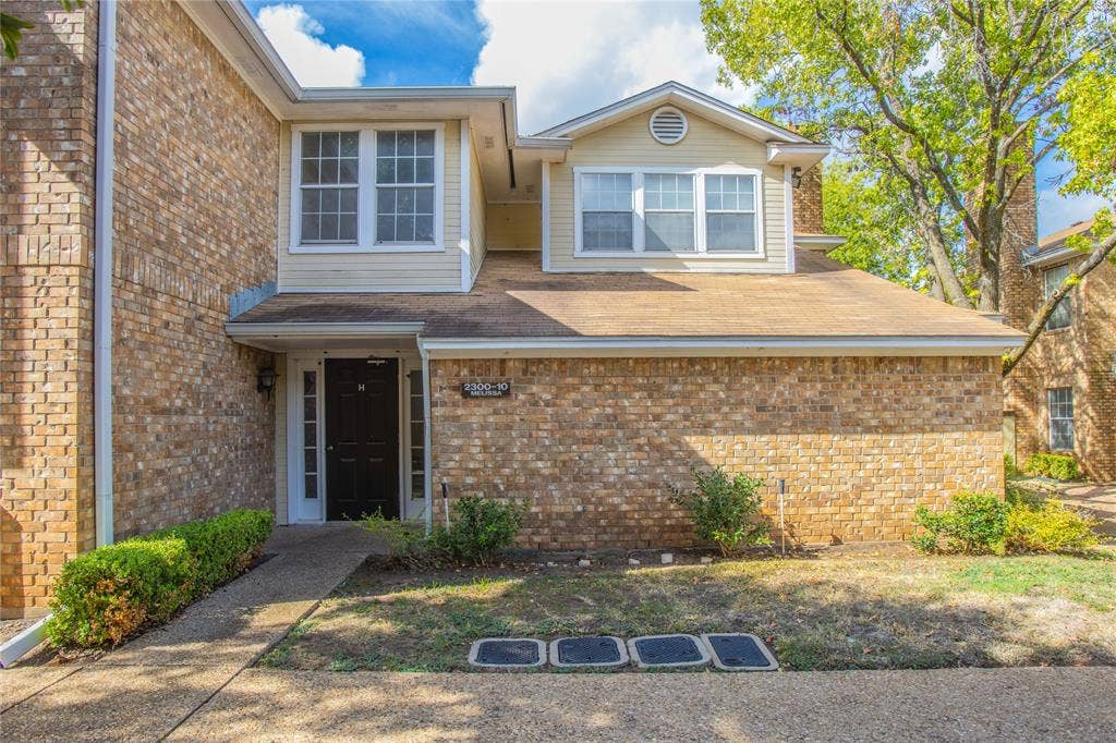 2308 Melissa Drive, #H5, Waco, TX 76708 Brick exterior with a gabled roofline and contrasting siding