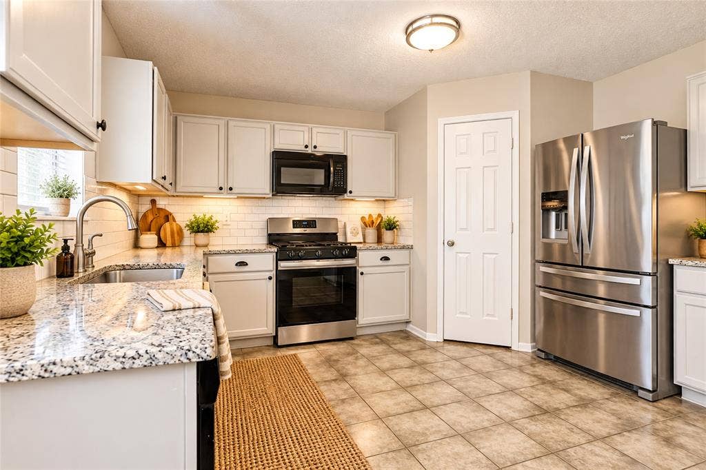 1856 Lariat Drive, Fort Worth, TX 76247 Kitchen view, virtually enhanced.