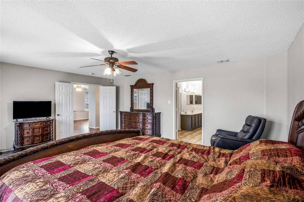 1856 Lariat Drive, Fort Worth, TX 76247 Primary bedroom