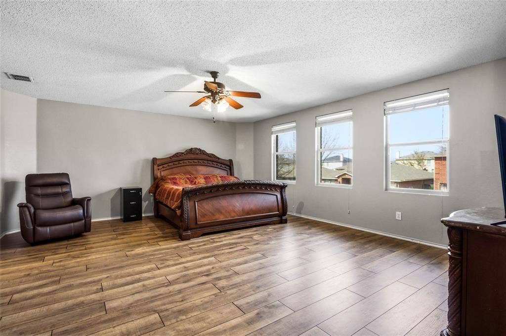 1856 Lariat Drive, Fort Worth, TX 76247 Large upstairs Primary bedroom, virtually enhanced.