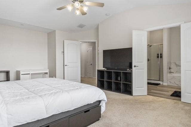 7944 Eddie Drive, Plano, TX 75025 Vaulted ceiling with ceiling fan, light-toned carpet flooring, white interior doors, and wood-finish flooring in the bathroom