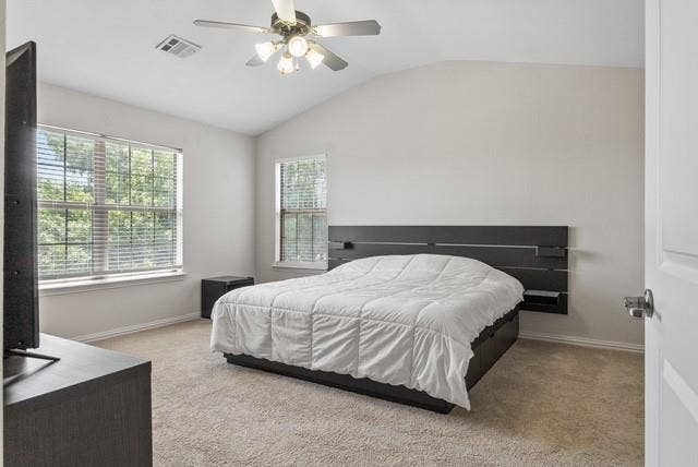 7944 Eddie Drive, Plano, TX 75025 Vaulted ceiling with an attached ceiling fan, dual windows with blinds, and neutral carpeting