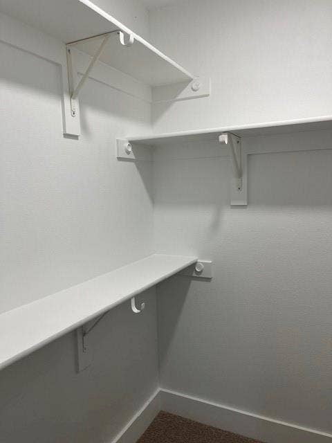 9473 Timberleaf Drive, Dallas, TX 75243 Built-in shelving with integrated hanging rods