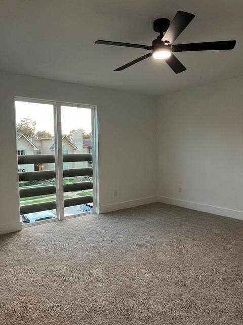 9473 Timberleaf Drive, Dallas, TX 75243 Recessed ceiling light, wall-to-wall carpeting, modern ceiling fan with integrated lighting, white walls, and a sliding glass door