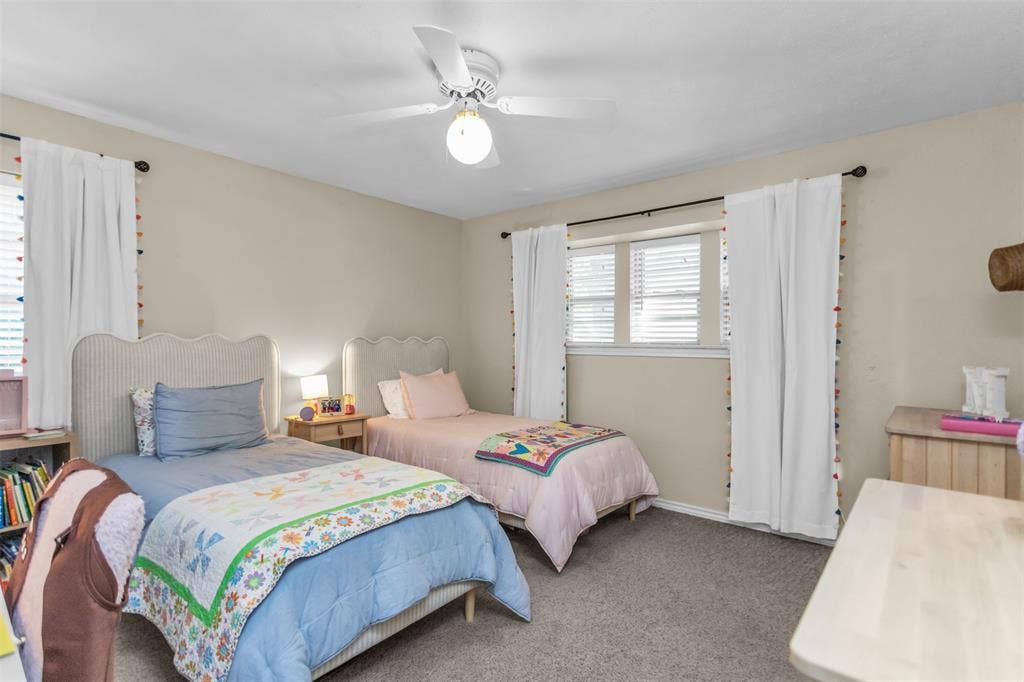 Recessed lighting, ceiling fan, neutral wall paint, window with blinds, and carpeting