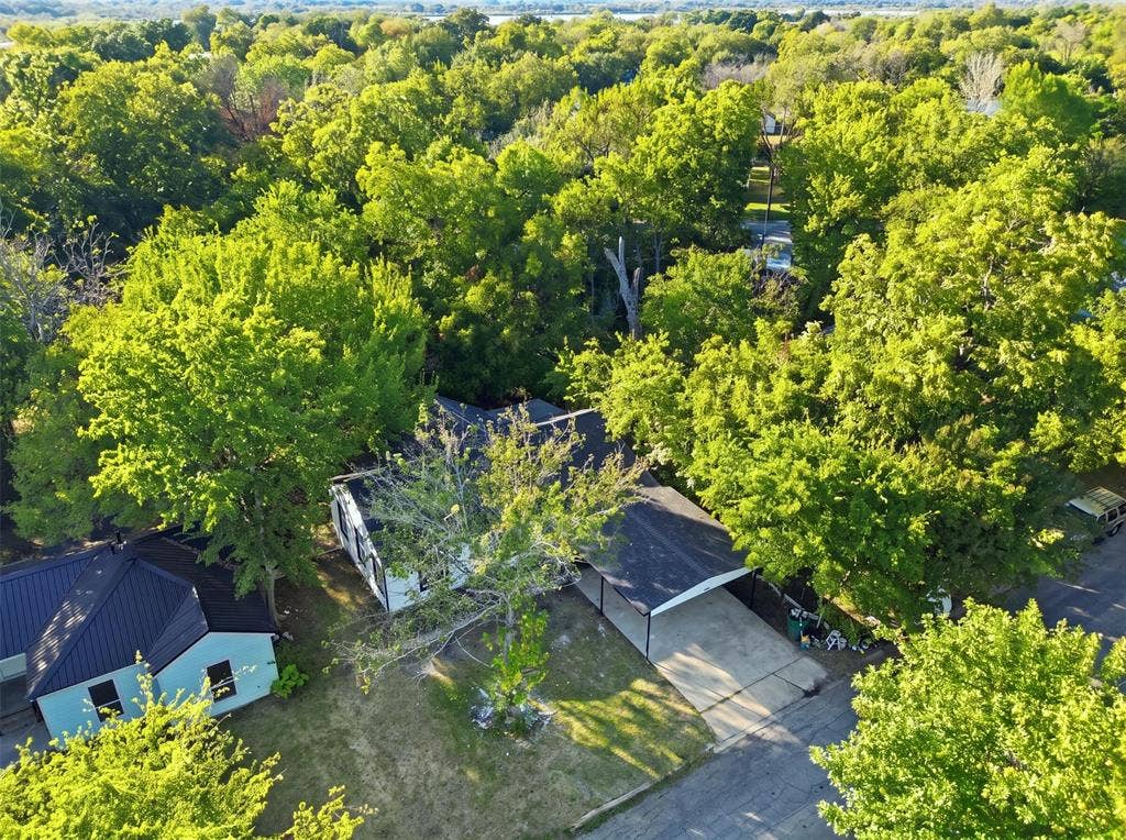 1105 Bell Drive, Greenville, TX 75401 Established neighborhood setting with mature trees