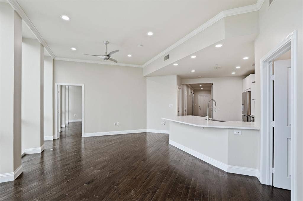 500 Throckmorton Street, #1605, Fort Worth, TX 76102 Dark wood-finish flooring with recessed lighting
