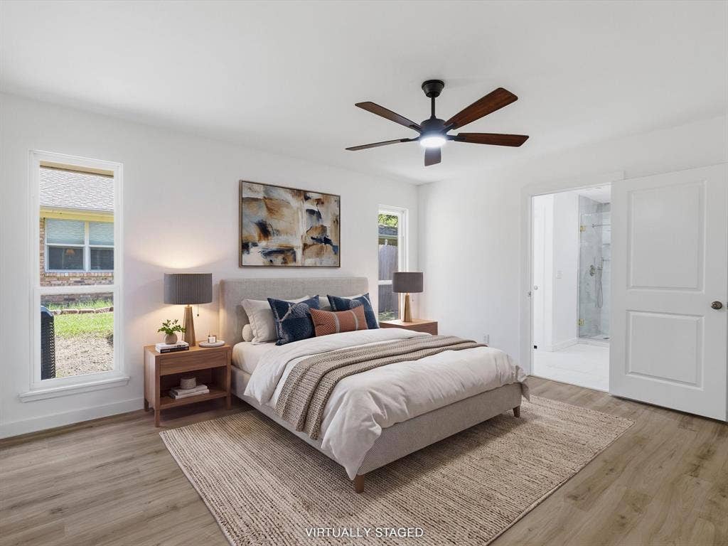 2500 Teakwood Lane, Plano, TX 75075 Wood-finish flooring, white walls, and a ceiling fan with integrated lighting