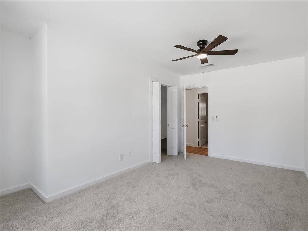 2500 Teakwood Lane, Plano, TX 75075 Plush carpet flooring, a ceiling fan with integrated lighting, and white walls