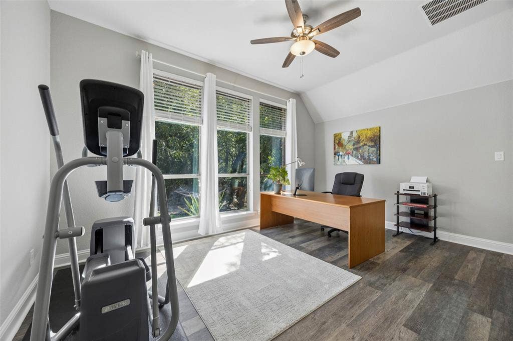 Bedroom currently utilized as an office with more amazing pool views