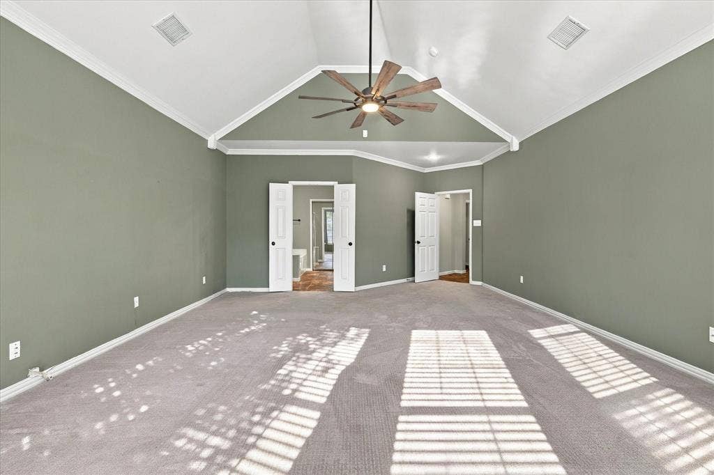 2412 Clearwood Lane, Flower Mound, TX 75028 GRAND SCALE MEETS SERENE SOPHISTICATION! A magnificent vaulted ceiling with graceful architectural detailing, soft neutral finishes, and generous floor space creates an impressive primary retreat with an atmosphere of understated luxury.
